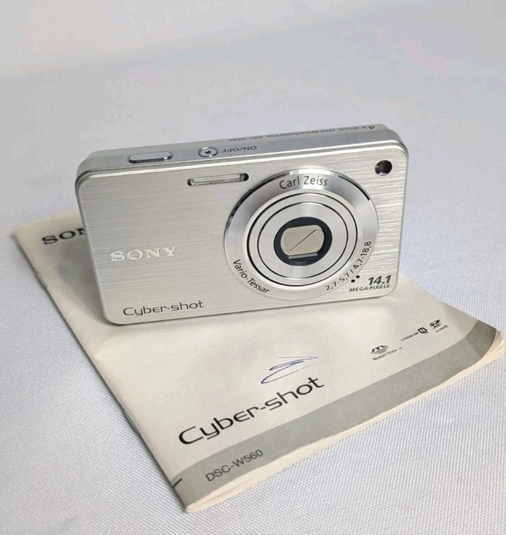 Sony Cyber Shot DSC-W560 14.1MP Digital Still Camera Silver Manual No Charger